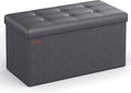 SONGMICS Mazie Collection - 30 Inches Folding Storage Ottoman Bench, Ottoman with Storage, Foot Rest Stool, Load 660 lb, for Living Room, Synthetic Leather, Dark Gray ULSF040G01